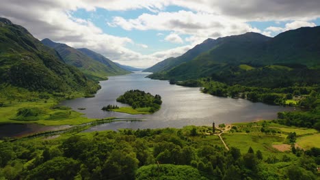 Aerial-Panoramic-View-And-Approach-Of-Loch-Shiel-And-Glenfinnan-Monument,-Glenfinnan,-Scottish-Highlands,-Scotland,-United-Kingdom