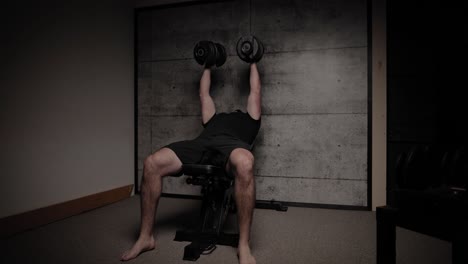 Incline-dumbbell-chest-fly,-cinematic-lighting,-white-man-dressed-in-black-gym-attire