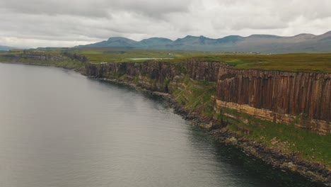 Aerial-Shot-Of-Kilt-Rock-From-Over-The-Sound-of-Raasay,-Isle-Of-Skye,-West-of-Scotland,-United-Kingdom