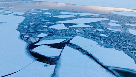 A-drone's-viewpoint-exploring-the-intricate-world-of-gigantic-ice-floes-on-the-water