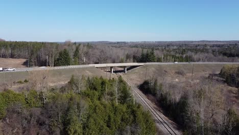 Aerial-View-Of-Cars-Driving-On-Bridge-In-Caledon,-Ontario