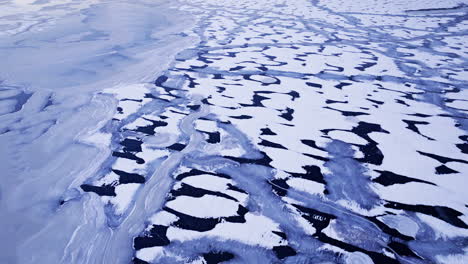Drone's-eye-view-of-vast-ice-blocks-floating-in-the-water
