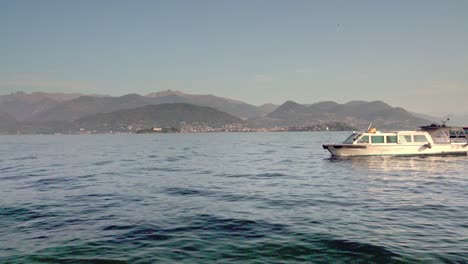 Sightseeing-boats-travel-across-Lake-Maggiore-on-a-nice-and-sunny-autumn's-day