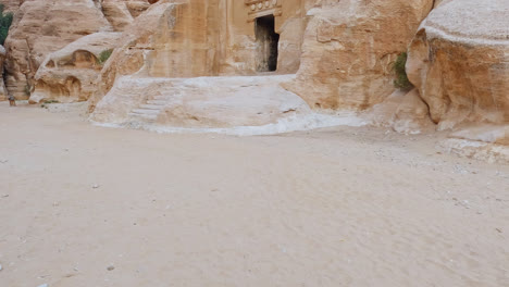 Slow-tilt-up-shot-of-Petra-rock-cut-architecture,-Jordan