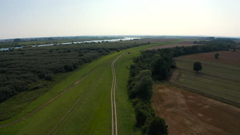 Aerial-view-of-drone-flying-above-farmland