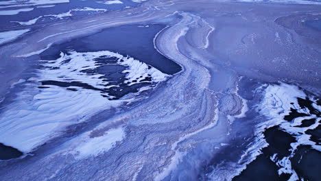 Drone-footage-capturing-the-expanse-of-ice-formations-in-the-water