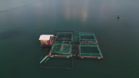 Aerial-view-of-Fishpen-cage-farming-in-Tagbilaran-city-bay,-Philippines