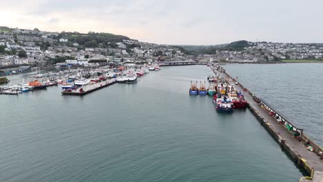 Low-panning-drone,aerial-Newlyn-harbour-Cornish-fishing-port-UK