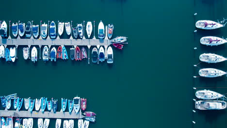 Aerial-view-of-marina-with-aligned-boats