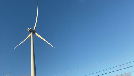 Wind-turbine-rotating-generating-clean,-sustainable-energy.-Handheld
