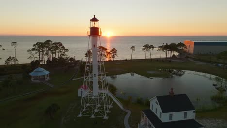 Drone-shot-of-sunset-and-beautiful-coastal-views-passing-by-the-Cape-San-Blas-Lighthouse-in-Port-St