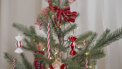 Decorated-Christmas-Tree-with-Red-and-White-Ornaments