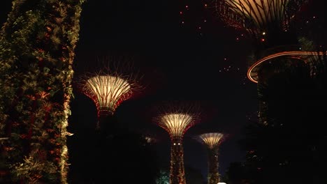 Looking-Up-At-Beautiful-Illuminated-Supertrees-At-Gardens-By-The-Bay-At-Night-In-Singapore