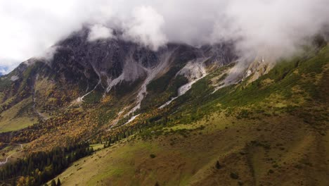 Epic-aerial-shot-of-Austrian-Alps-in-Autumn-fall,-Hochkonig-Mountains,-dolly-in