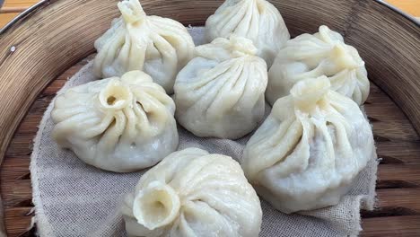 Hot-meat-dumplings-close-up-in-bamboo-steamer
