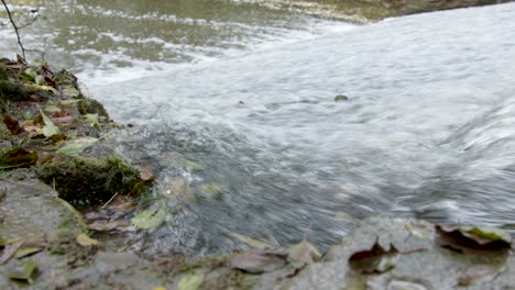 Close-up-water-flow-of-the-Leigh-Brook-flowing-through-the-Knapp-and-Paper-mill-Abberley-and-Malvern-Hills-Geopark