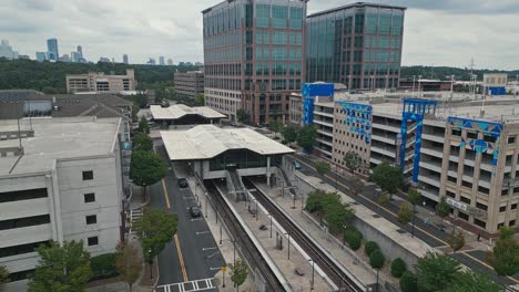 Aerial-view-of-LINDBERGH-CENTER-STATION-and-office-buildings-with-downtown-of-Atlanta-city-in-background