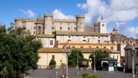 View-on-the-main-square-of-Bracciano-with-its-iconic-castle-in-the-background