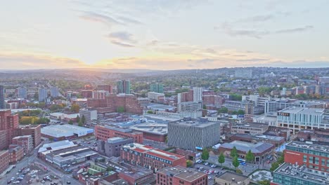 Drone-shot-large-urban-city-landscape-at-summer-sunset-in-England