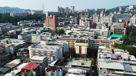 Aerial-Flyover-Of-Asian-City-Guandu-In-Taipei,-Travel-Destination