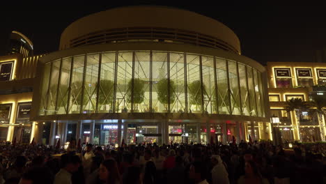 Night-view-of-bustling-outdoor-mall-with-lively-crowd