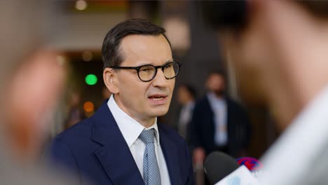 Polish-Prime-Minister-Mateusz-Morawiecki-giving-a-statement-at-the-European-Council-summit-in-Brussels,-Belgium---Close-shot,-Slow-motion