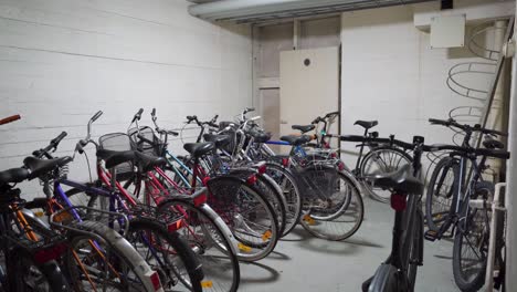Bunch-of-bicycles-in-a-bicycle-storage-room