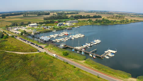 Aerial-shot-of-drone-flying-around-marina,-yachting-in-poland