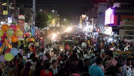 mob-walking-at-crowded-city-shopping-street-at-evening-from-flat-angle-video-is-taken-at-sardar-market-ghantaGhar-jodhpur-rajasthan-india-on-Nov-06-2023