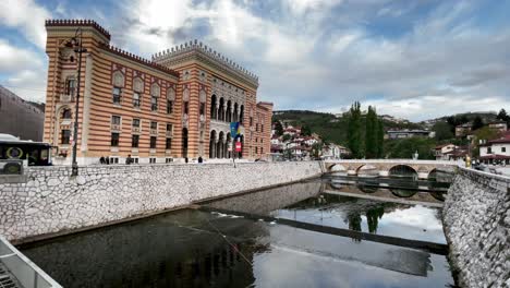 SARAJEVO:-Strolling-along-the-Miljacka-River-with-a-view-of-the-City-Hall-Arts-in-Sarajevo
