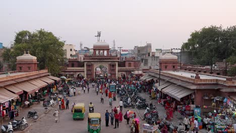people-walking-at-crowded-city-shopping-street-at-evening-from-flat-angle-video-is-taken-at-sardar-market-ghantaGhar-jodhpur-rajasthan-india-on-Nov-06-2023