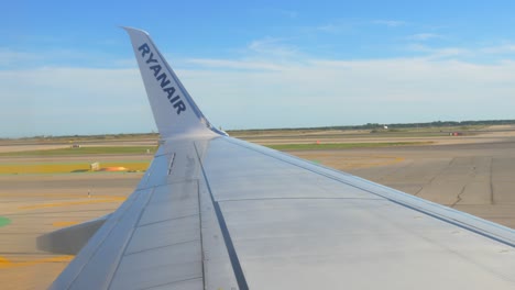 Airplane-preparing-to-take-off-wing-view