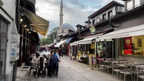 SARAJEVO:-Cultural-Heritage,-Latin-Bridge,-Clock-Tower,-Gazi-Husrev-beg-Mosque,-Sebilj-Fountain,-Historical-Sites,-Scenic-Walk,-Bosnia-and-Herzegovina,-Cobblestone-Streets,-Mosque-Visits