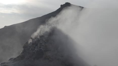 Smoky-volcanic-ridge-in-Iceland's-rugged-terrain