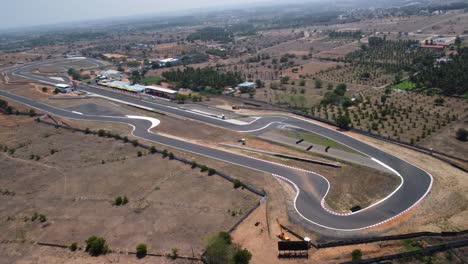 Panoramic-aerial-view-of-Kari-Motor-Speedway-Racetrack-in-Chettipalayam,-Coimbatore,-Tamil-Nadu,-India