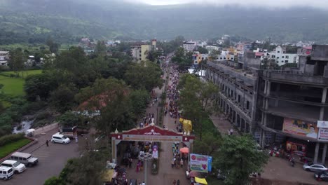Aerial-view-of-the-crowd-of-Hindu-devotees-approaching-a-junction-while-taking-on-foot-journey-around-the-spiritual-mountain-of-Brahmgiri-in-Trimbakeshwar