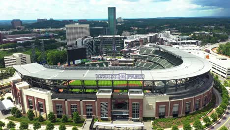 Aerial-approaching-shot-of-Truist-Park-Basenball-Stadium-with-tower-in-Atlanta-City,-Georgia