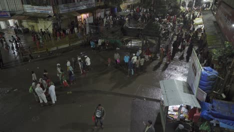 Aerial-of-the-crowd-of-Hindu-devotees-at-Kushavarta-Kund-to-take-holy-dip-early-morning-during-the-month-of-Shravana-near-Trimbakeshwar-temple
