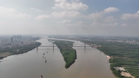 Horizon-of-atmospheric-haze-covers-Hanoi,-Nhat-Tan-Bridge-foreground