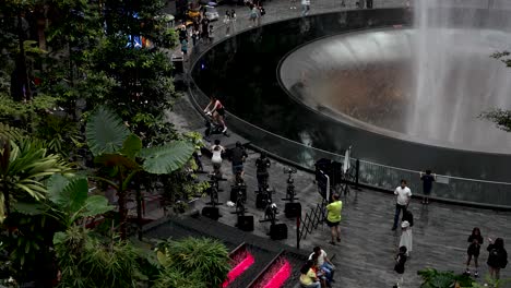 Looking-Down-At-Spin-Class-Session-Taking-Place-Beside-Rain-Vortex-At-Jewel-Changi-Airport