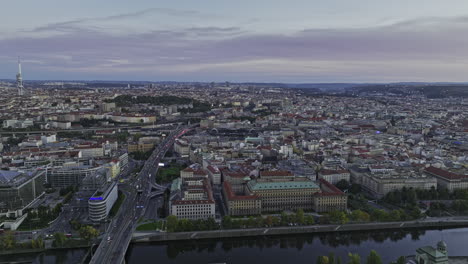 Prague-Czechia-Aerial-v68-drone-flyover-Vltava-river-and-Stvanice-island-capturing-historical-cityscape-of-Petrska-Ctvrt-and-Old-town-districts-at-sunset---Shot-with-Mavic-3-Cine---November-2022