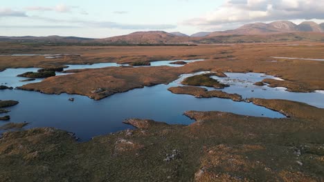 Aerial-of-Connemara,-Roundstone-Bog---natural-wonder-that-beckons-with-its-unique-and-mysterious-allure