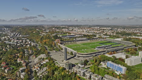 Prague-Czechia-Aerial-v43-drone-fly-around-one-of-the-world-largest-sports-venue,-Great-Strahov-Stadium-on-Petrin-hill-capturing-surrounding-cityscape---Shot-with-Mavic-3-Cine---November-2022