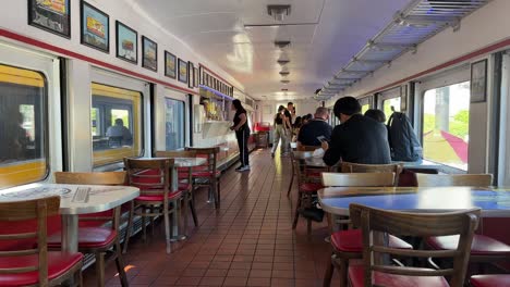 Inside-rail-car-at-Carney's-restaurant-known-for-hot-dogs-and-burgers-on-Sunset-Blvd-in-Los-Angeles