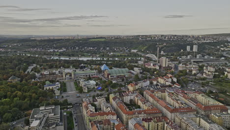 Prague-Czechia-Aerial-v107-drone-flyover-Holesovice-Amusement-Park-vintage-fairground,-cityscape-of-Bubny,-Stvanice-island-and-Karlin-across-Vltava-river---Shot-with-Mavic-3-Cine---November-2022