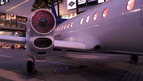 A-decommissioned-airplane-on-display-in-front-of-a-popular-shopping-mall-in-Pattaya-in-Chonburi-province,-Thailand
