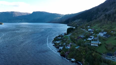 Stavenes-Norway,-Windy-autumn-morning-aerial-along-Sorfjorden
