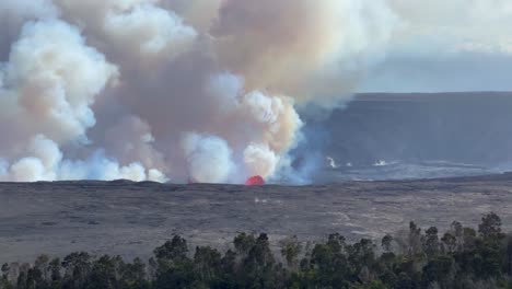 Cinematic-long-lens-shot-of-Kilauea-Crater-from-Volcano-House-as-eruption-continues-on-the-its-first-day-in-September-2023-at-Hawai'i-Volcanoes-National-Park