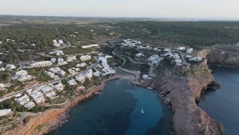 Panoramic-aerial-overview-of-Cala-Morell-peaceful-village-by-the-sea
