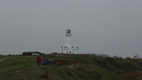 Static-shot-of-tourists-exploring-Flamborough-Head-Lighthouse